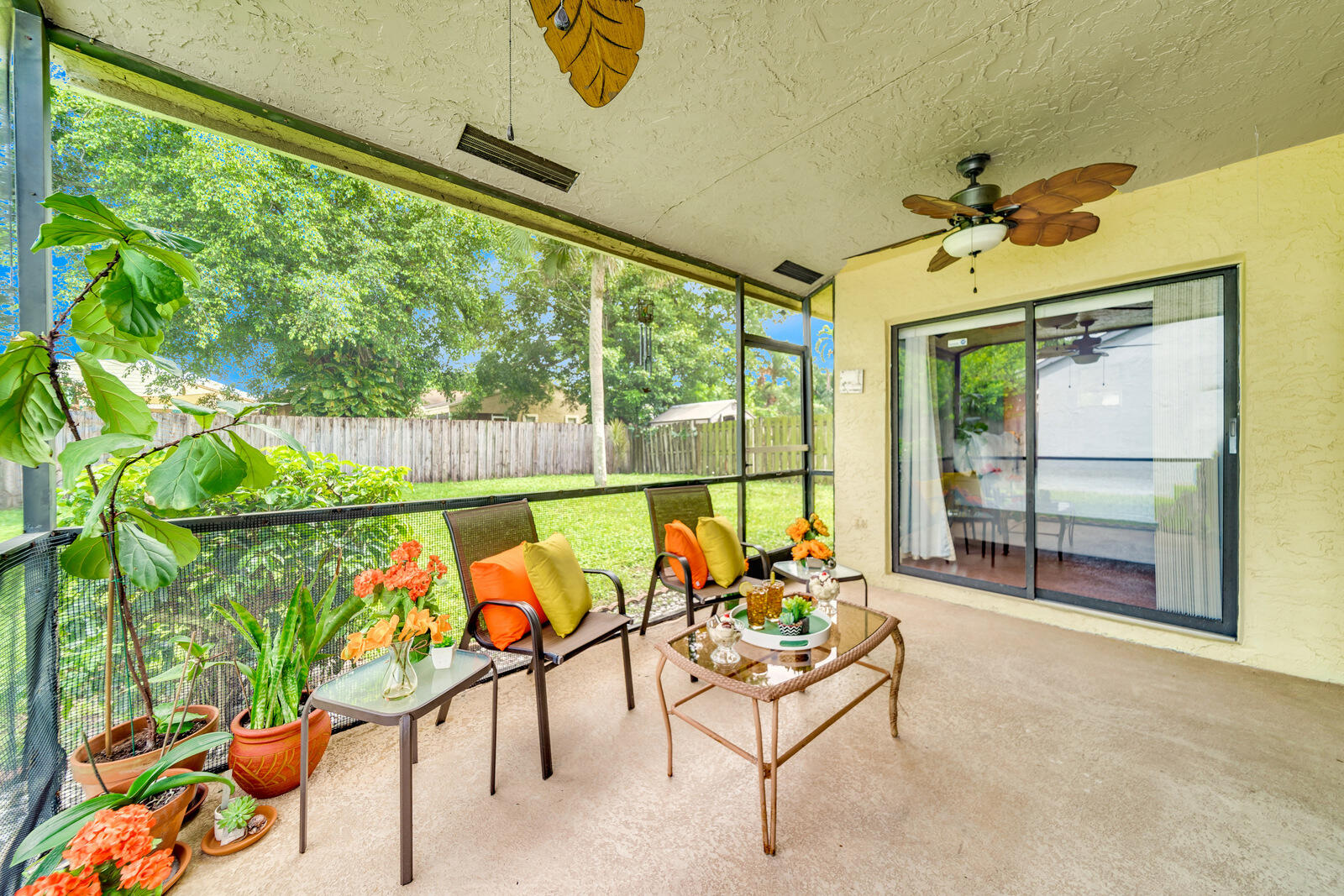 23250 Sedawie Drive Boca Raton, FL 33433 - Photo 32 of 42 a balcony with furniture and a potted plant