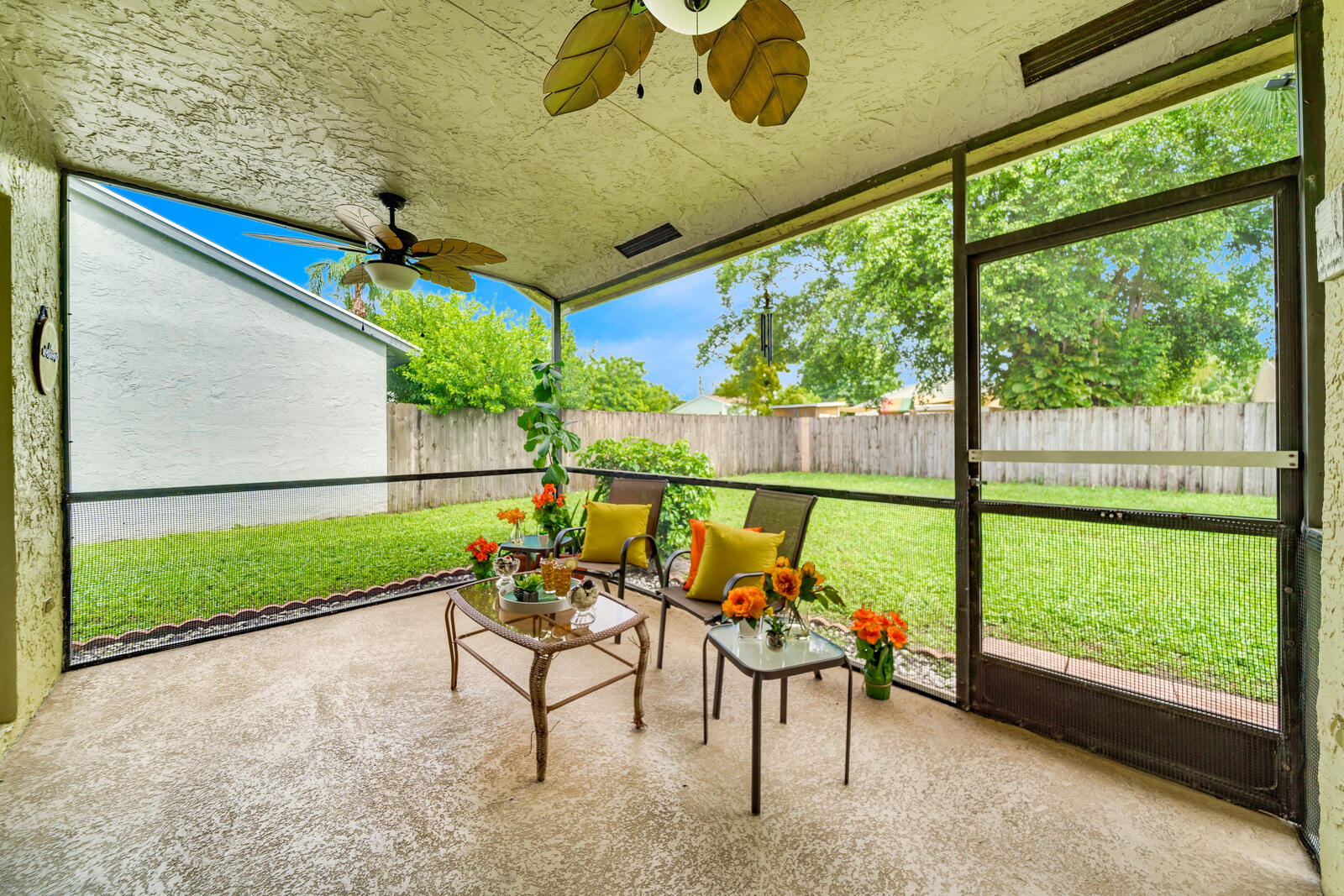 23250 Sedawie Drive Boca Raton, FL 33433 - Photo 35 of 42 a view of chairs and bench in the yard
