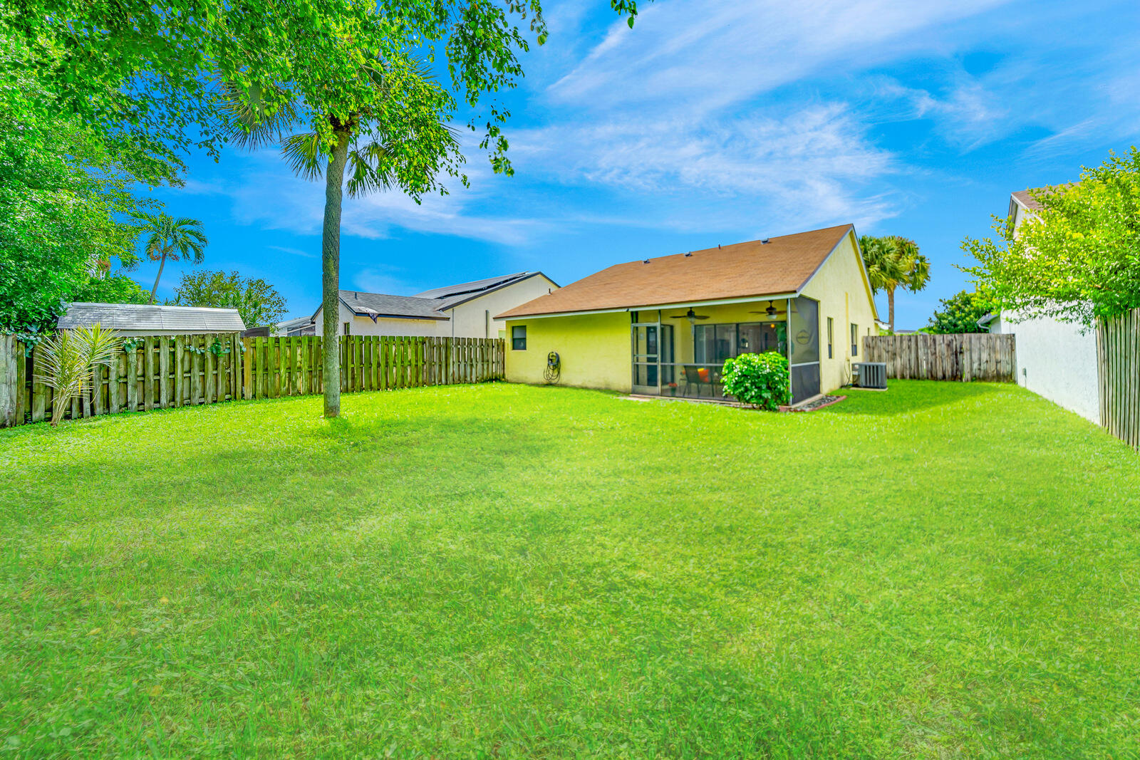 23250 Sedawie Drive Boca Raton, FL 33433 - Photo 37 of 42 a view of a house with a yard