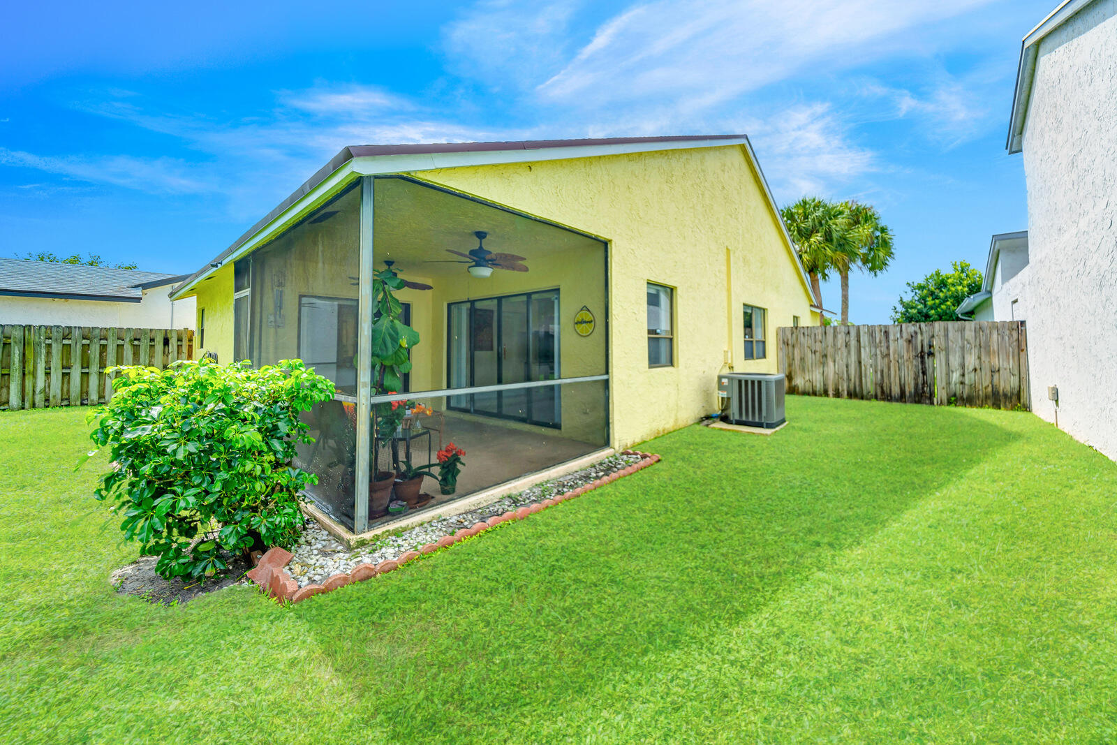 23250 Sedawie Drive Boca Raton, FL 33433 - Photo 38 of 42 a view of an house with backyard and a tree