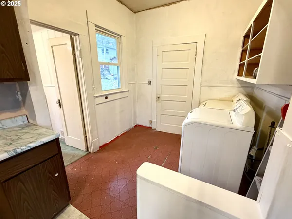 a bedroom with a bed and furniture