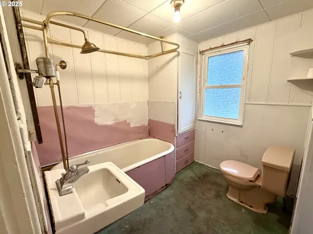 a bathroom with a sink and a tub