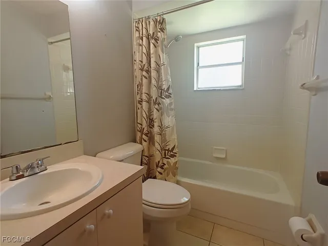 a bathroom with a sink a toilet and a bathtub