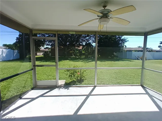 a view of a porch with a garden