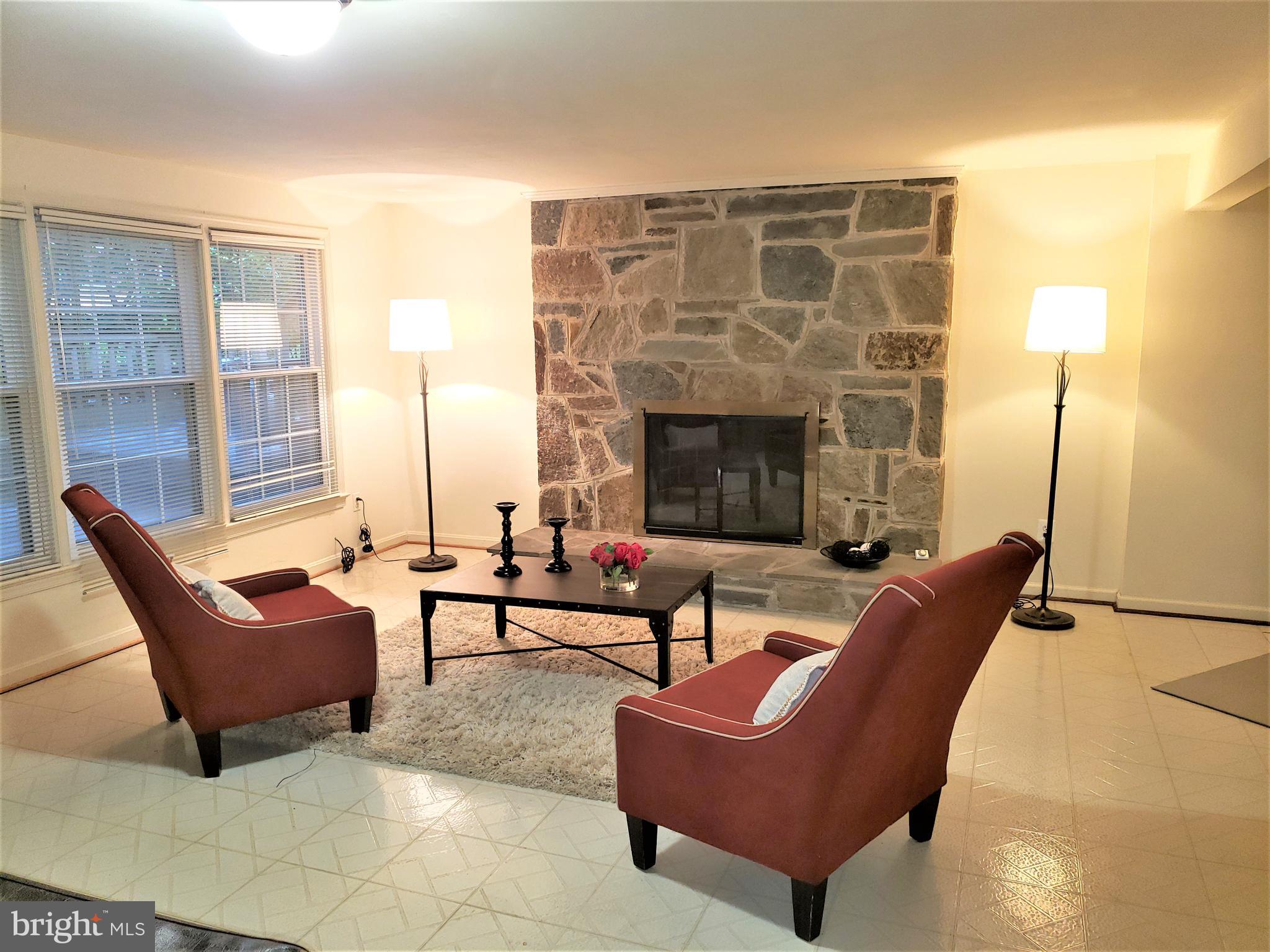 8412 Jeb Stuart Road Potomac, MD 20854 - Photo 13 of 25 Gorgeous Stone Fireplace