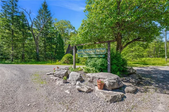 a view of backyard with green space