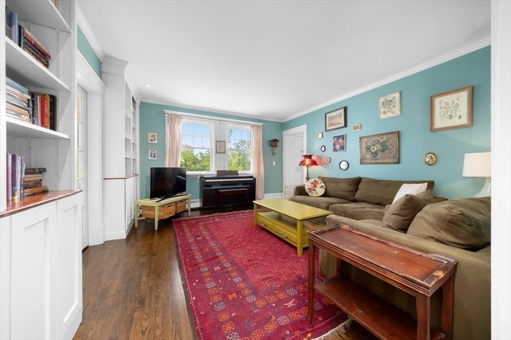 13 Ship Street Hingham, MA 02043 - Photo 15 of 37 a living room with furniture and a wooden floor