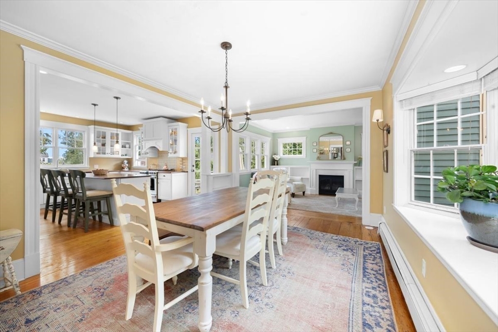 13 Ship Street Hingham, MA 02043 - Photo 8 of 37 a view of a dining room with furniture window and wooden floor