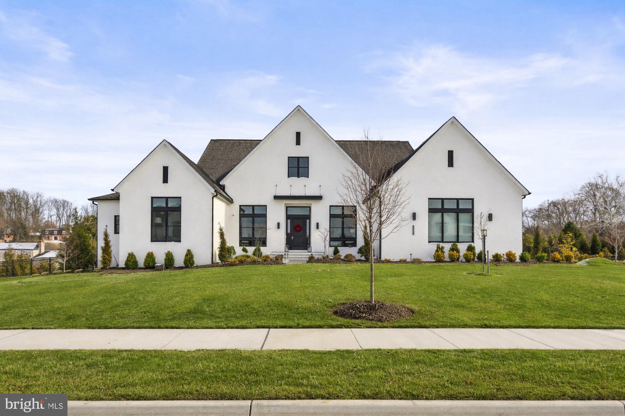 1221 Riley Preserve Court McLean, VA 22102 - Photo 1 of 94 a front view of a house with a yard