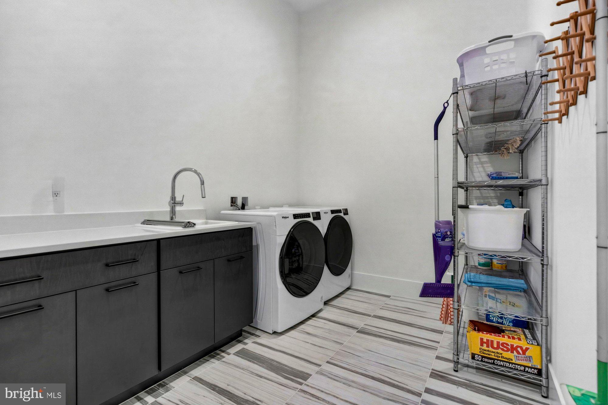 1221 Riley Preserve Court McLean, VA 22102 - Photo 20 of 94 a utility room with sink dryer and washer