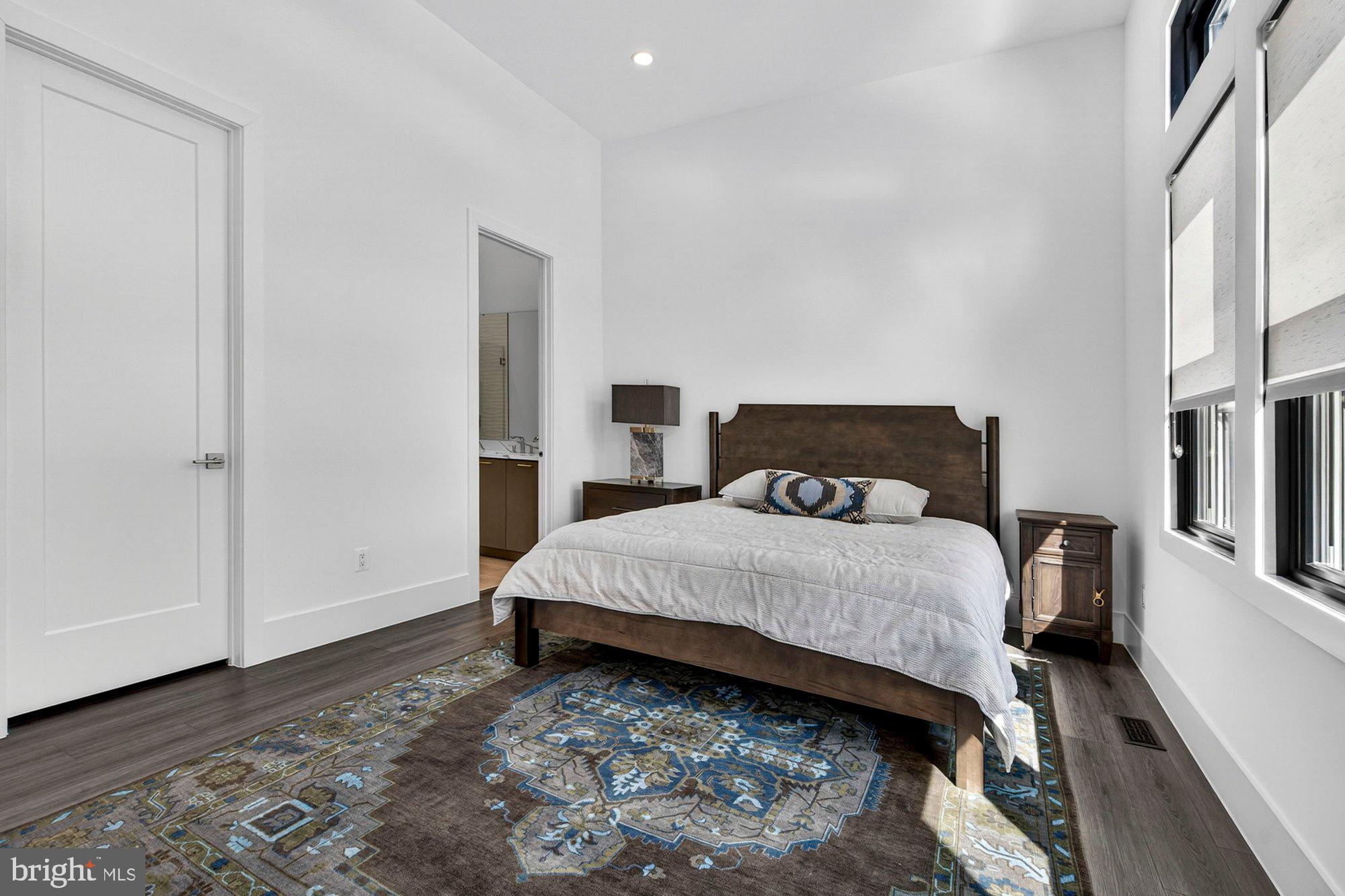 1221 Riley Preserve Court McLean, VA 22102 - Photo 38 of 94 a bedroom with a bed and a refrigerator