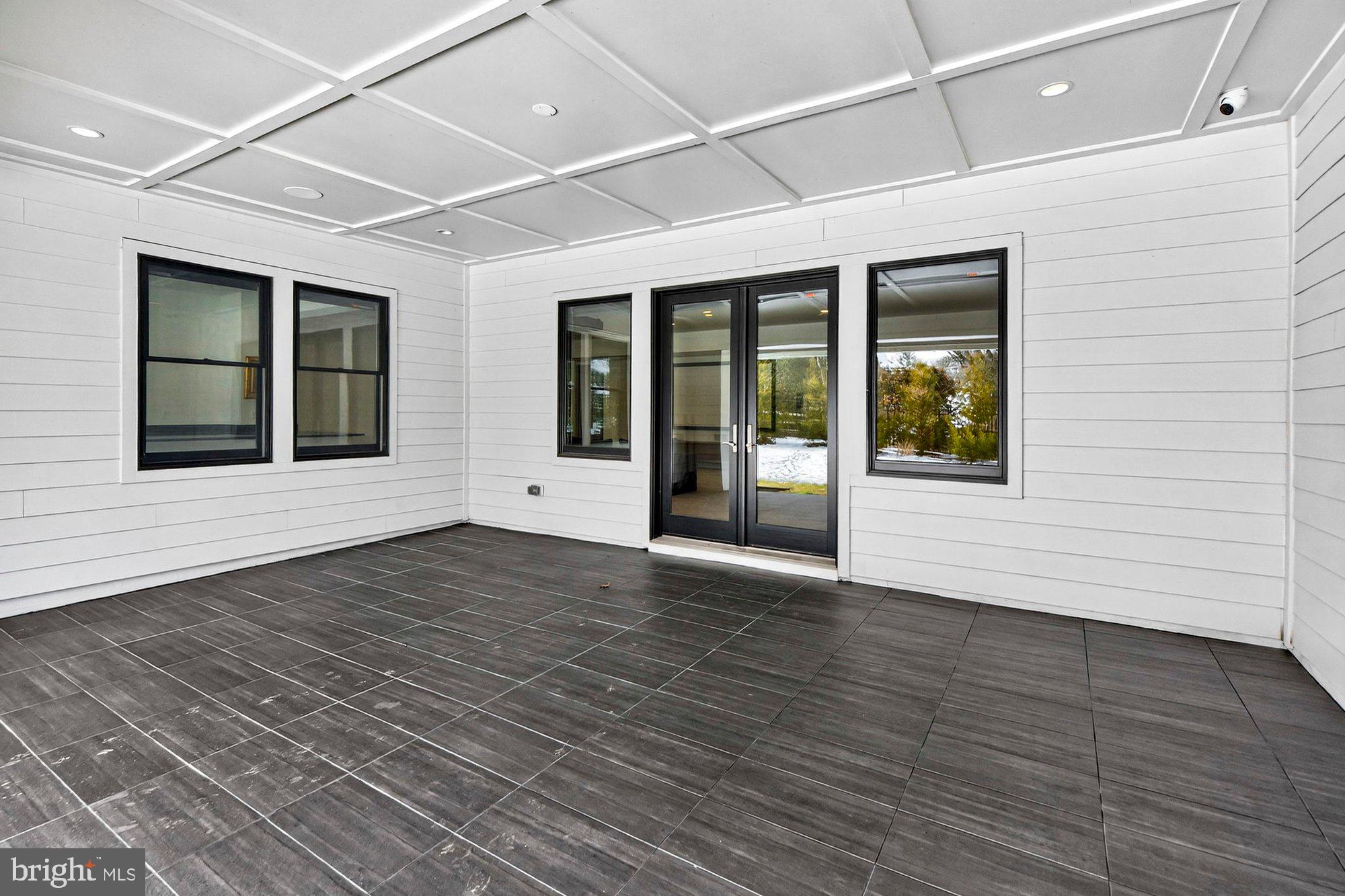 1221 Riley Preserve Court McLean, VA 22102 - Photo 82 of 94 a view of an empty room with wooden floor and a window