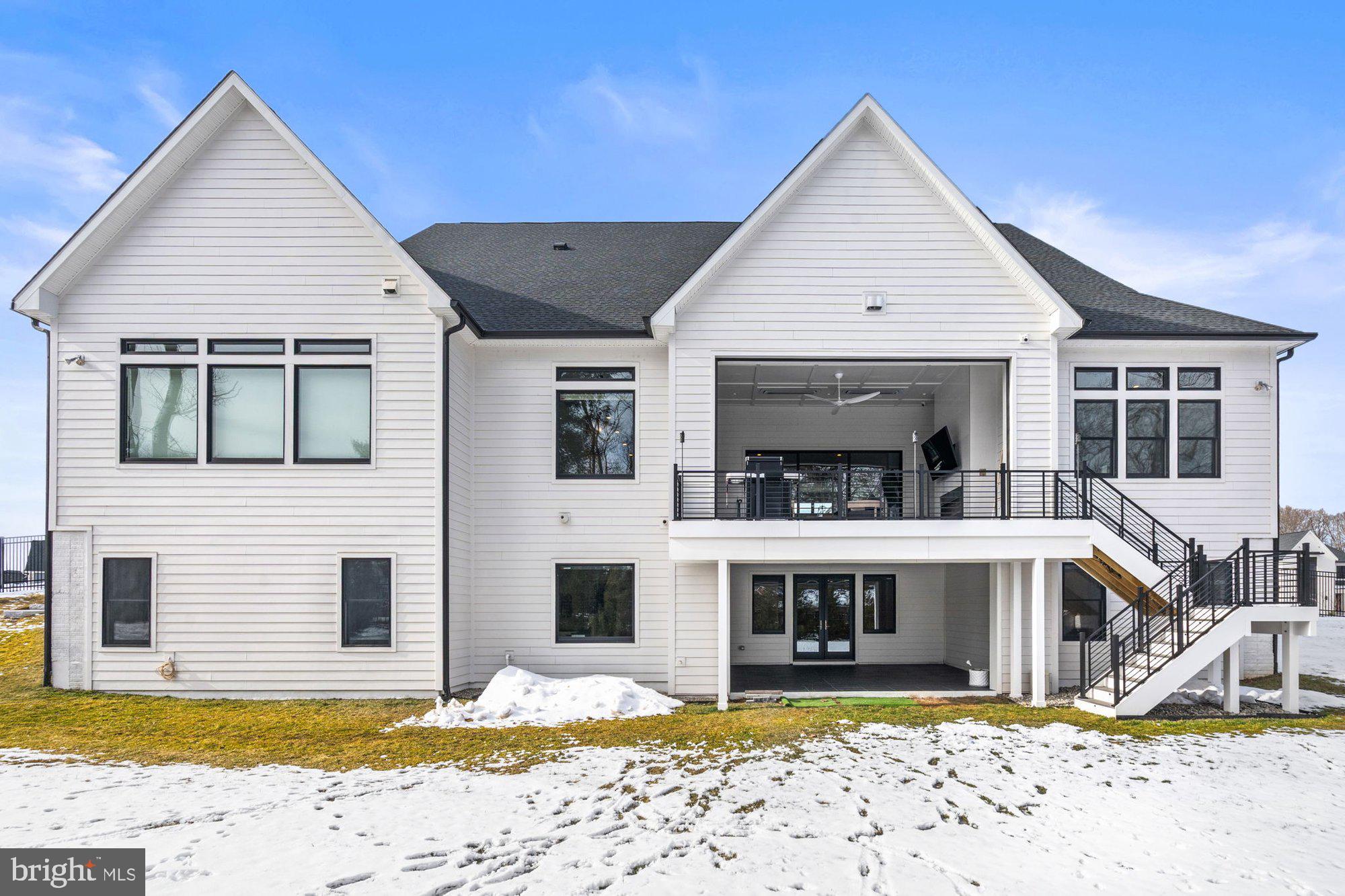 1221 Riley Preserve Court McLean, VA 22102 - Photo 83 of 94 a view of a house with snow on the side of it