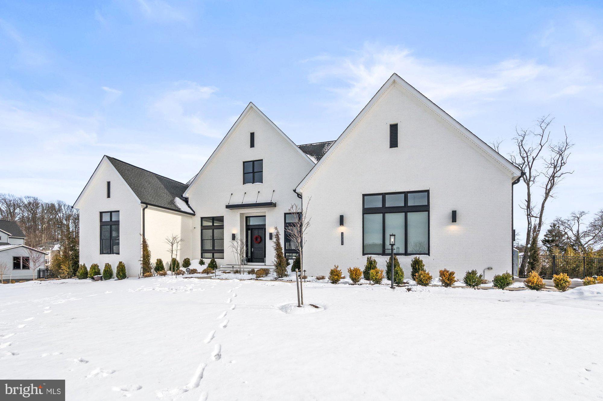 1221 Riley Preserve Court McLean, VA 22102 - Photo 91 of 94 a view of a white house with a outdoor space