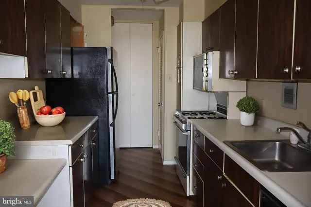 a bathroom with a toilet and a sink