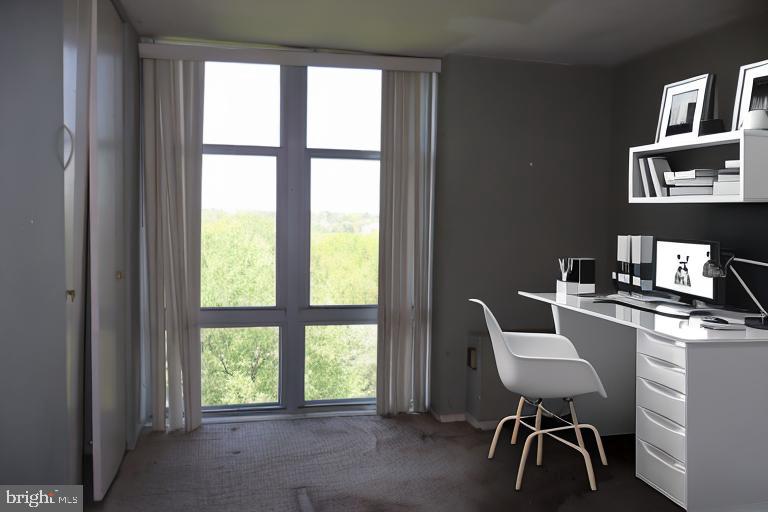 3600 Conshohocken Avenue, Unit 1004 Philadelphia, PA 19131 - Photo 17 of 17 a workspace with furniture hardwood and a window