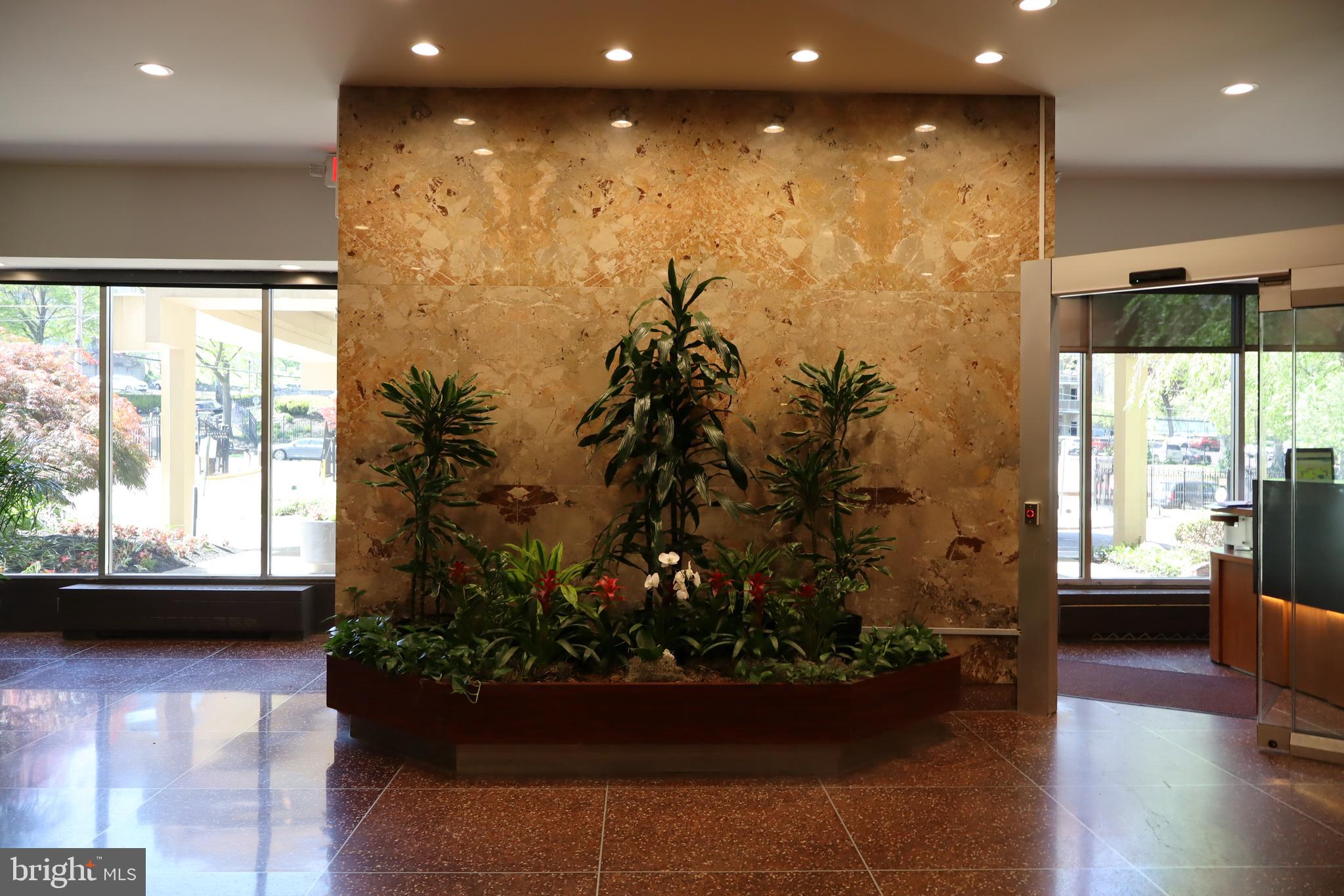 3600 Conshohocken Avenue, Unit 1004 Philadelphia, PA 19131 - Photo 6 of 17 a view of a living room and floor to ceiling window or wooden floor