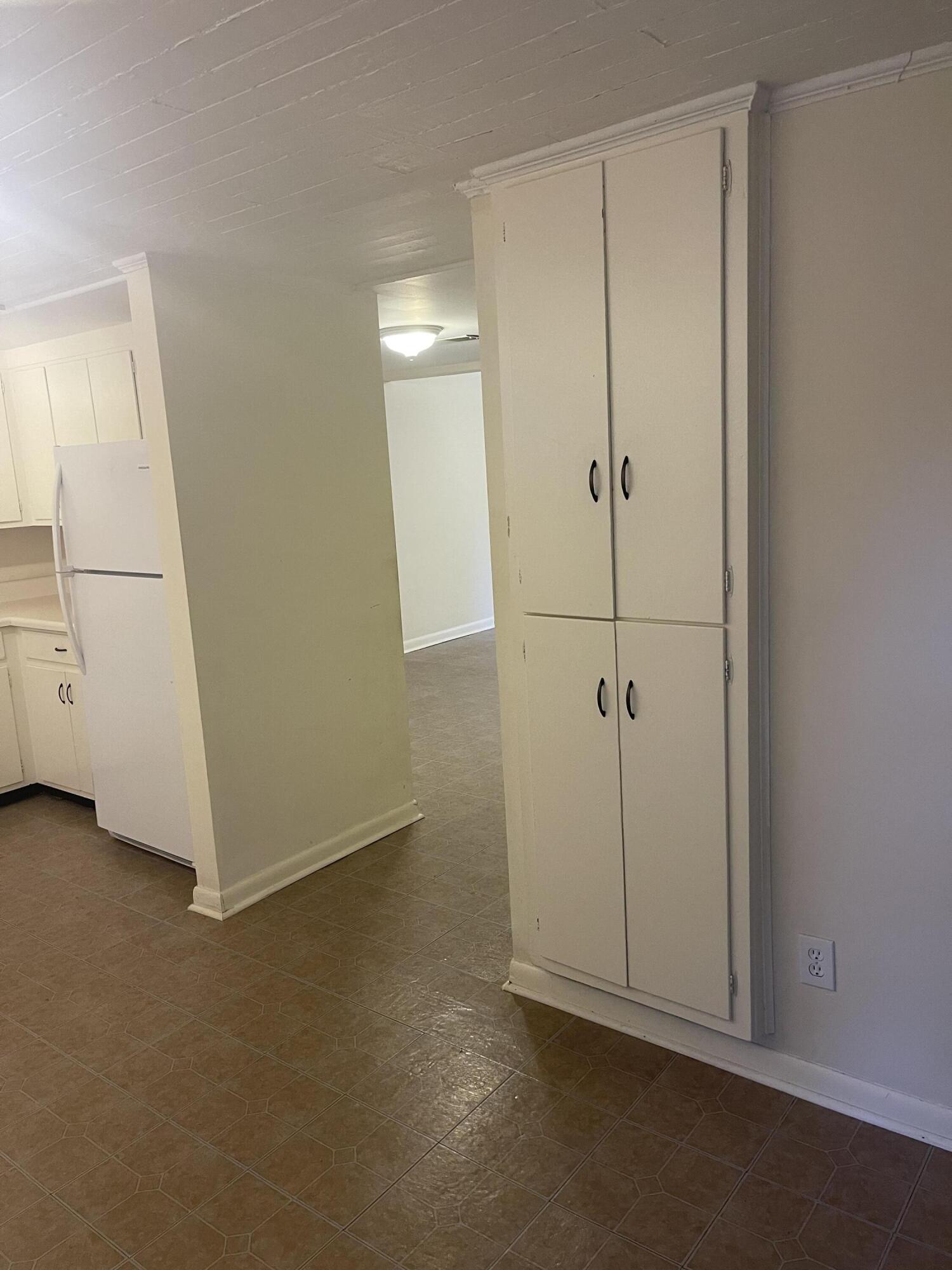 709 Cedar Rock Road Thomson, GA 30824 - Photo 11 of 12 pantry to dining