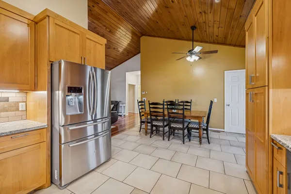 a utility room with closet dryer and washer