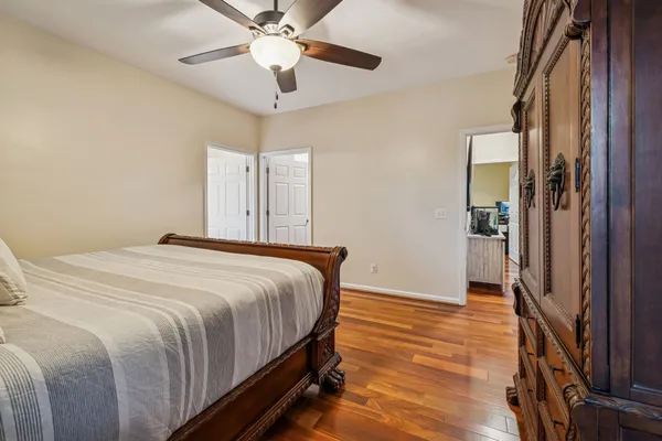 a kitchen with granite countertop a stove and a refrigerator