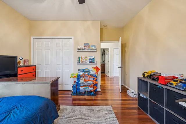 a view of a garage with storage and utility