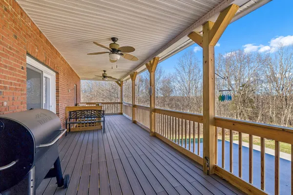 a kitchen with stainless steel appliances granite countertop a refrigerator stove top oven a sink and dishwasher