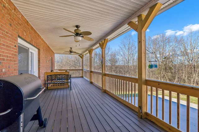 a kitchen with stainless steel appliances granite countertop a refrigerator stove top oven a sink and dishwasher