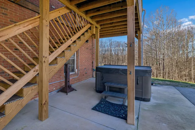 a dining space with furniture and a potted plant