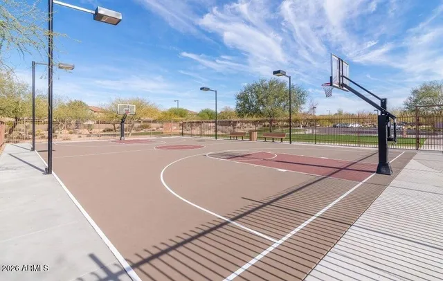 an aerial view of a residential houses with city view