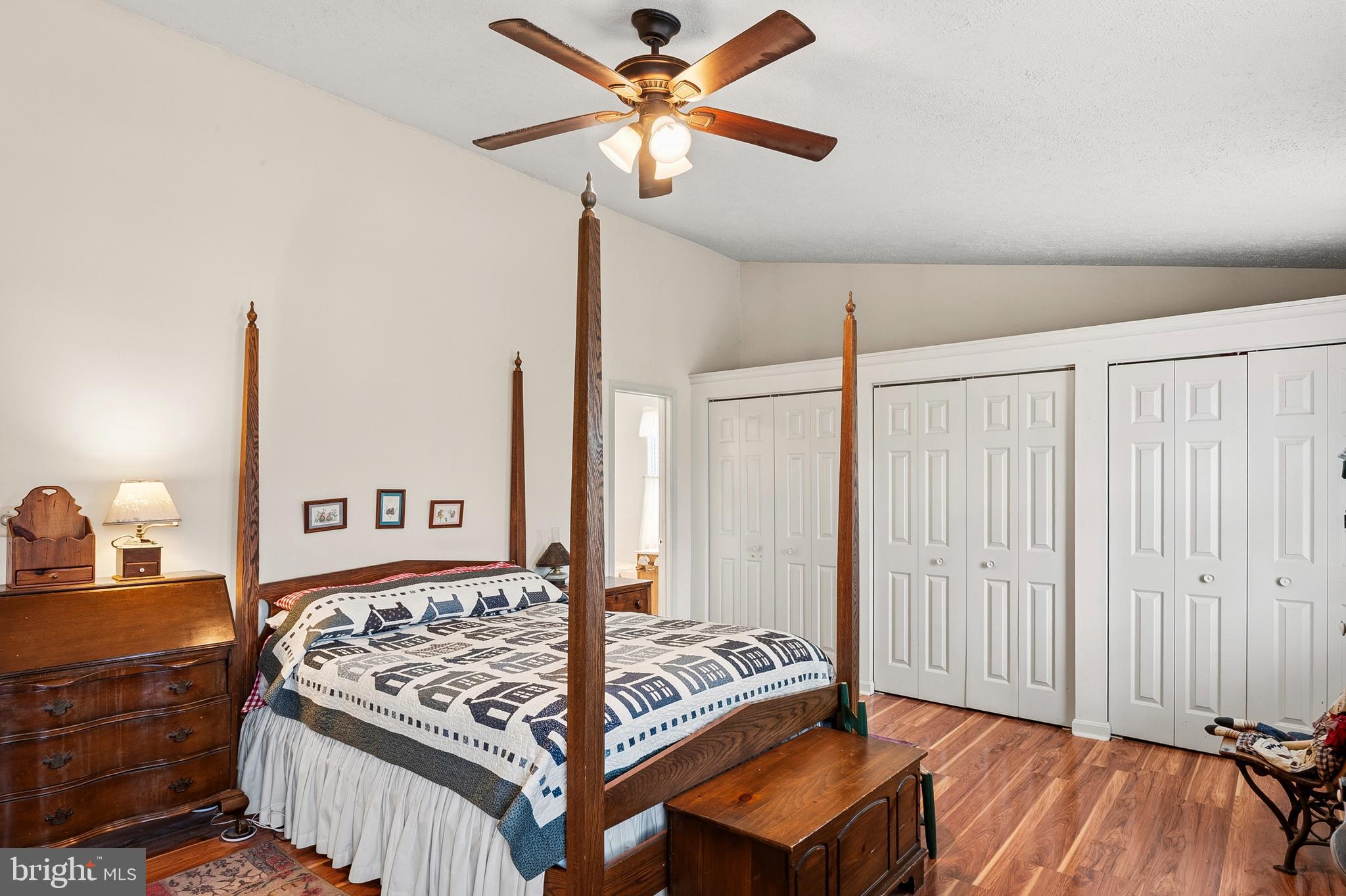 6415 Michael Elizabeth Way Hanover, MD 21076 - Photo 21 of 32 a bed room with a bed and a chandelier