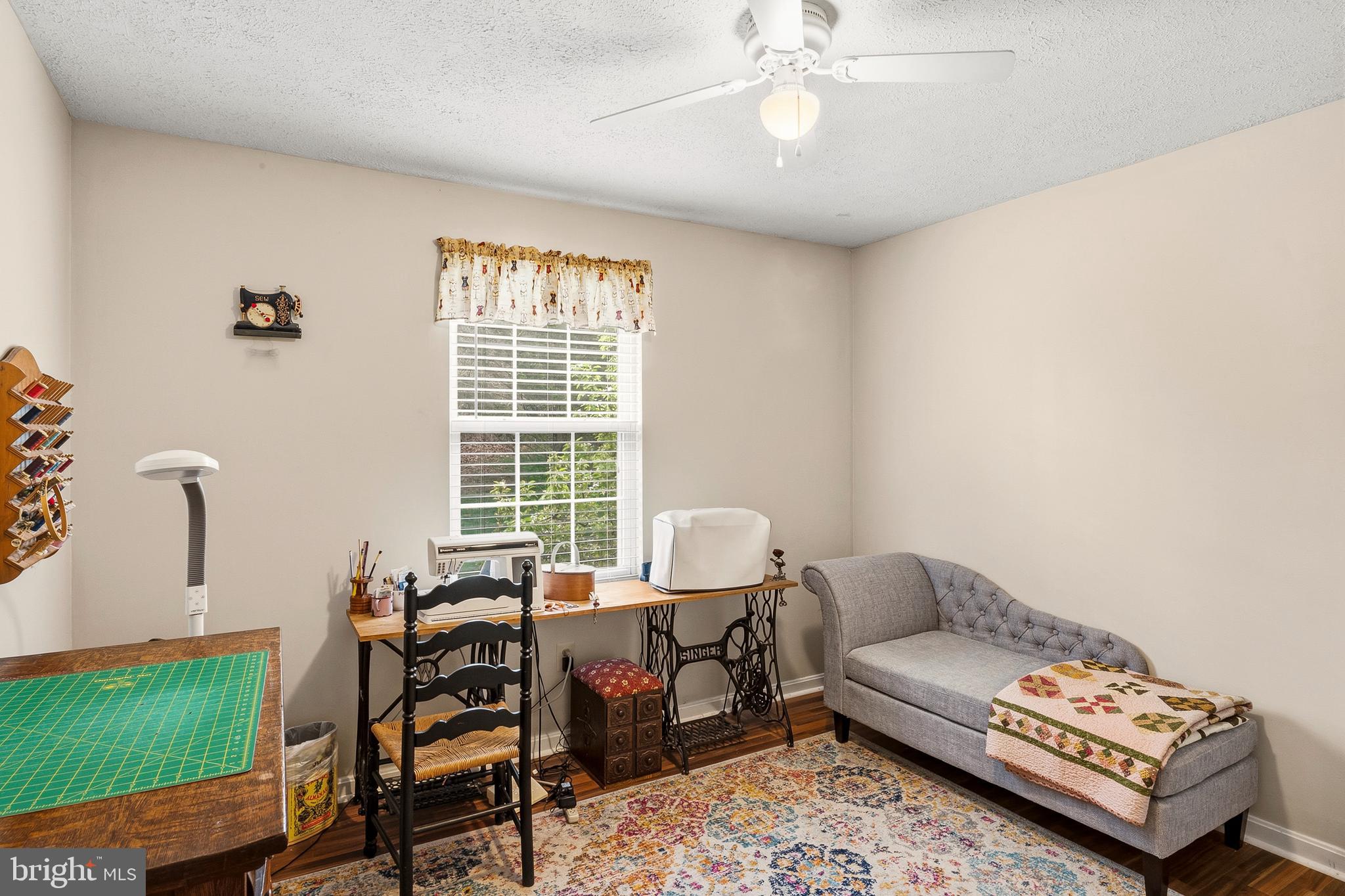 6415 Michael Elizabeth Way Hanover, MD 21076 - Photo 27 of 32 a living room with furniture and a large window