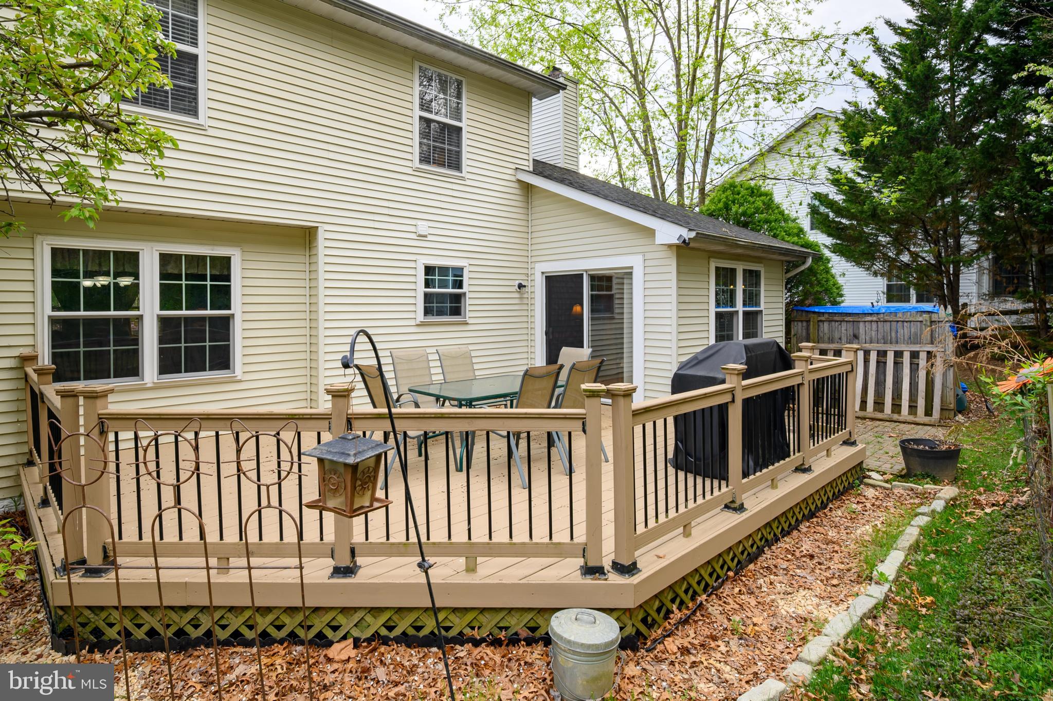 6415 Michael Elizabeth Way Hanover, MD 21076 - Photo 30 of 32 a view of a house with a deck