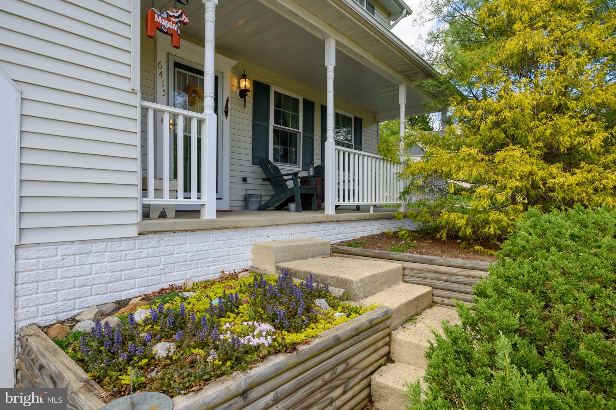 6415 Michael Elizabeth Way Hanover, MD 21076 - Photo 4 of 32 front view of a house with a small yard
