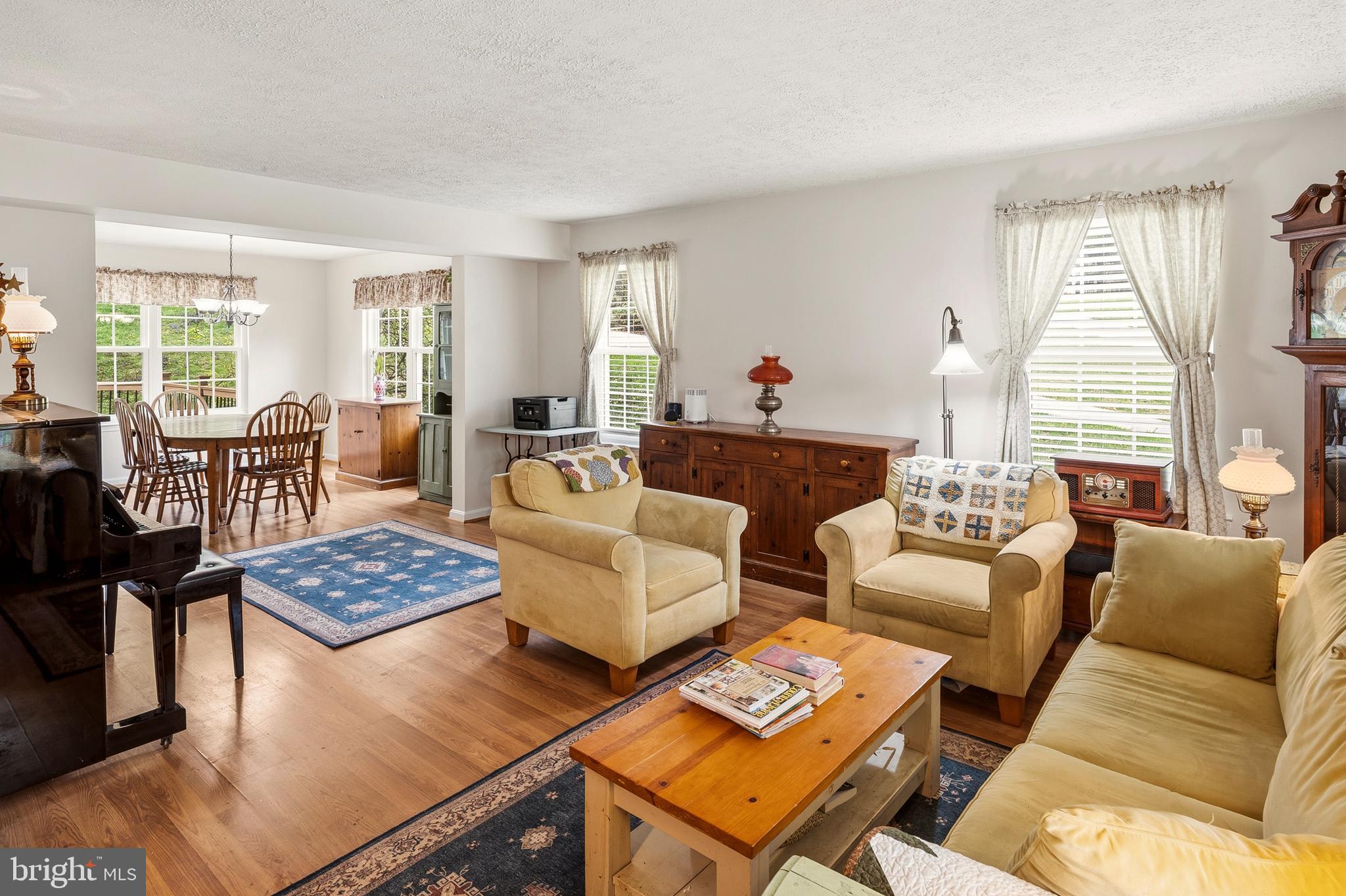 6415 Michael Elizabeth Way Hanover, MD 21076 - Photo 8 of 32 a living room with furniture and a window