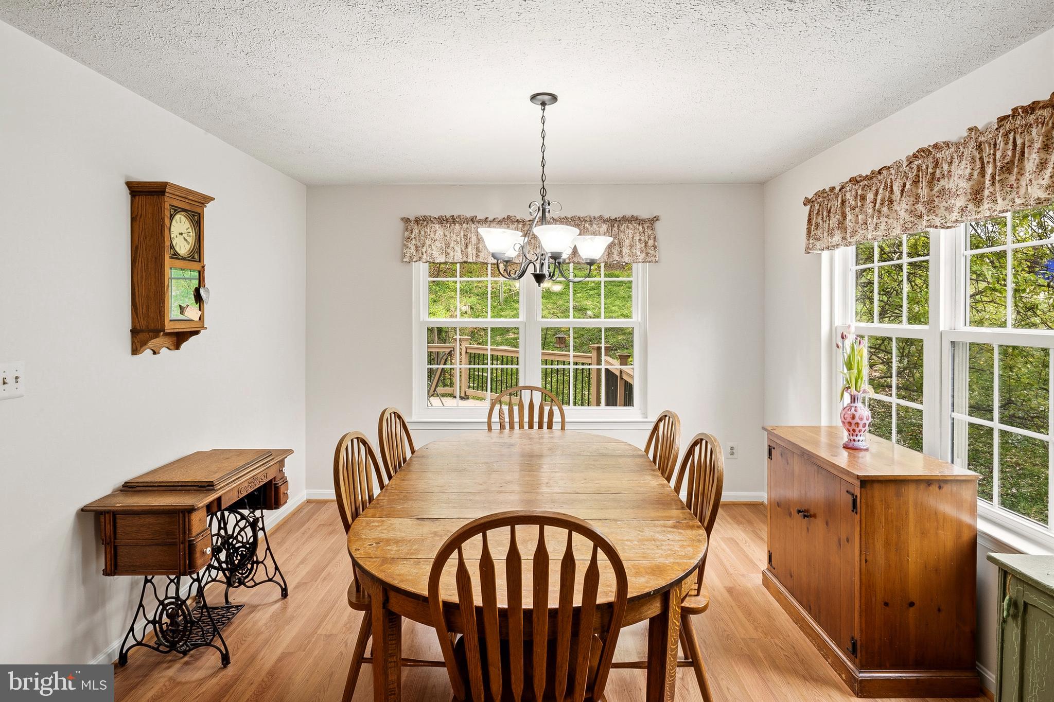 6415 Michael Elizabeth Way Hanover, MD 21076 - Photo 9 of 32 a view of a dining room with furniture window and outside view