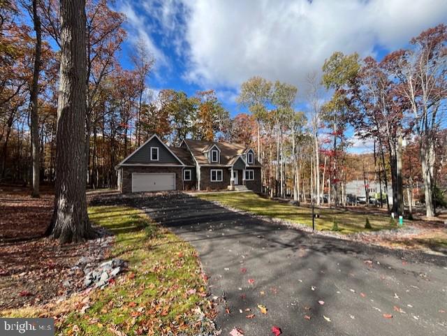 5 Tioga Drive Hazleton, PA 18202 - Photo 1 of 92 a view of a house with a big yard and large trees