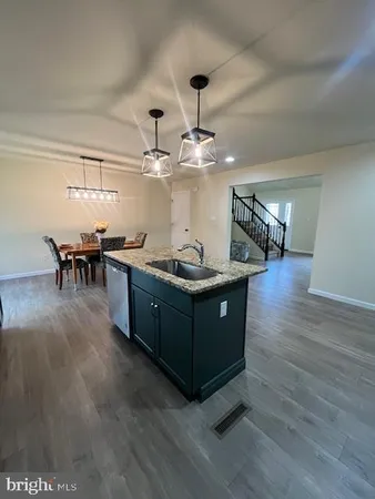 a view of a livingroom with furniture and fireplace
