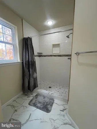 a view of a room with rack on the wall