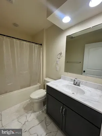 a view of a house with a street