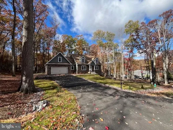 a front view of house with yard
