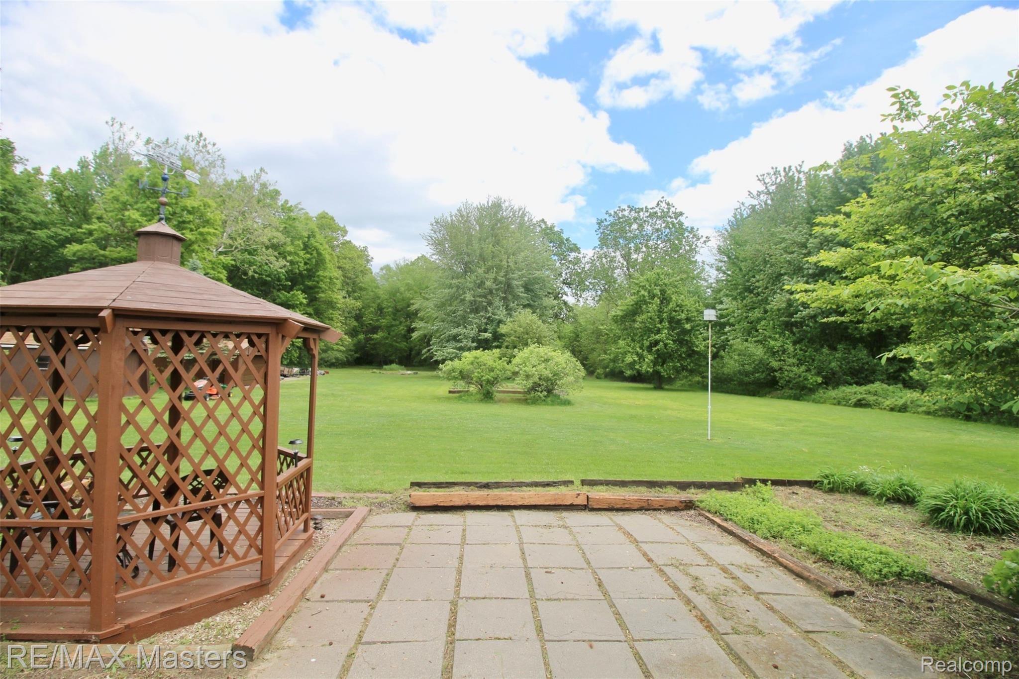 25777 Inkster Road Flat Rock, MI 48134 - Photo 41 of 52 While sitting in the gazebo, you can enjoy the view of your yard, plus the wooded rear yard that goes all the way back to the subdivision!! Over ----- feet!