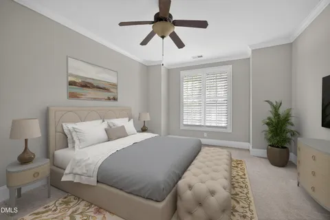 a bedroom with a bed and a potted plant