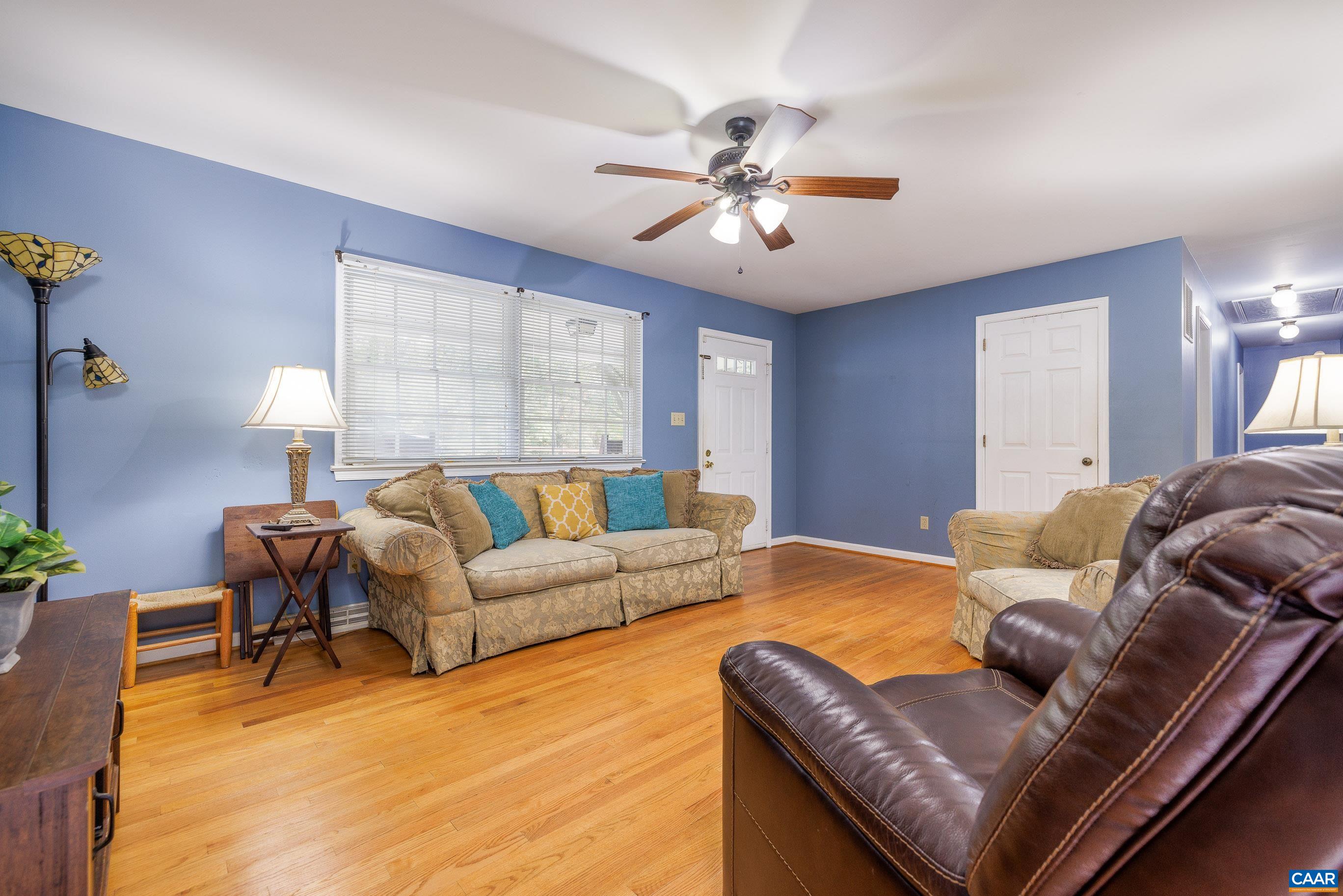 335 Morning Glory Road Ruckersville, VA 22968 - Photo 13 of 43 a living room with furniture and a large window