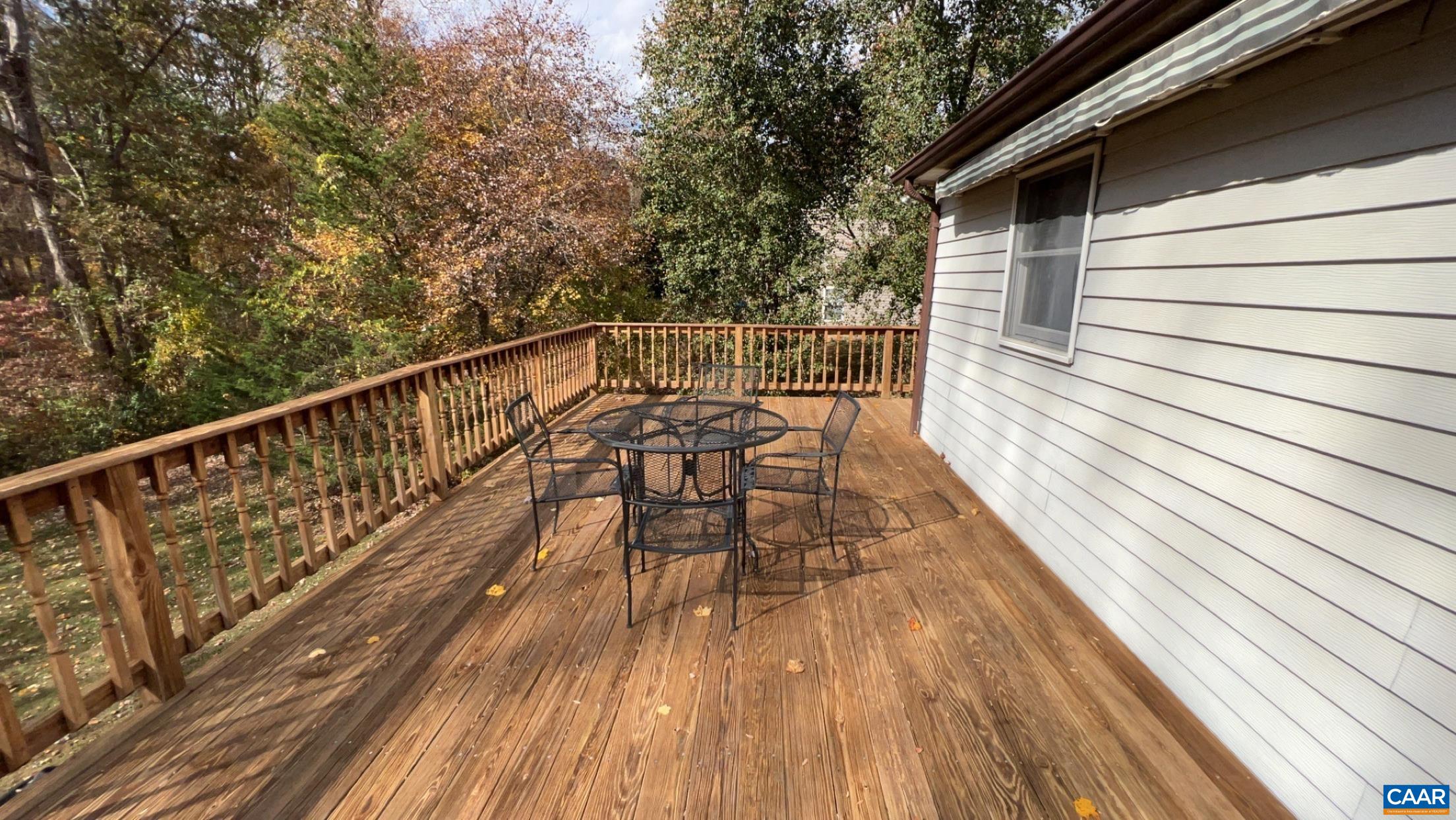 335 Morning Glory Road Ruckersville, VA 22968 - Photo 43 of 43 a view of balcony with wooden floor and fence