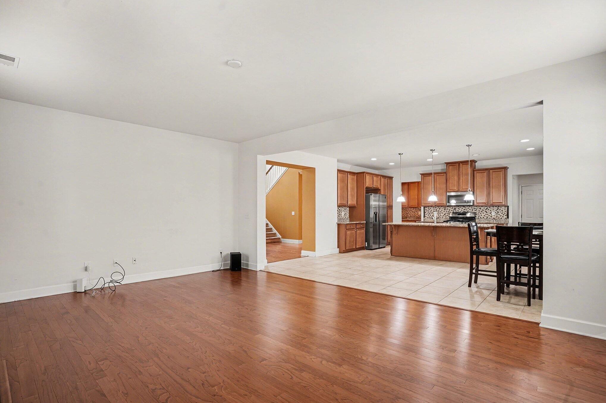 208 Buttonbush Court Moncks Corner, SC 29461 - Photo 11 of 38 Family Room to Kitchen View