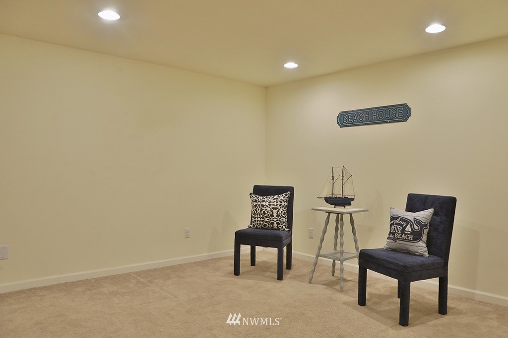 6301 Wahl Road Freeland, WA 98249 - Photo 22 of 40 a view of a room with furniture and a potted plant