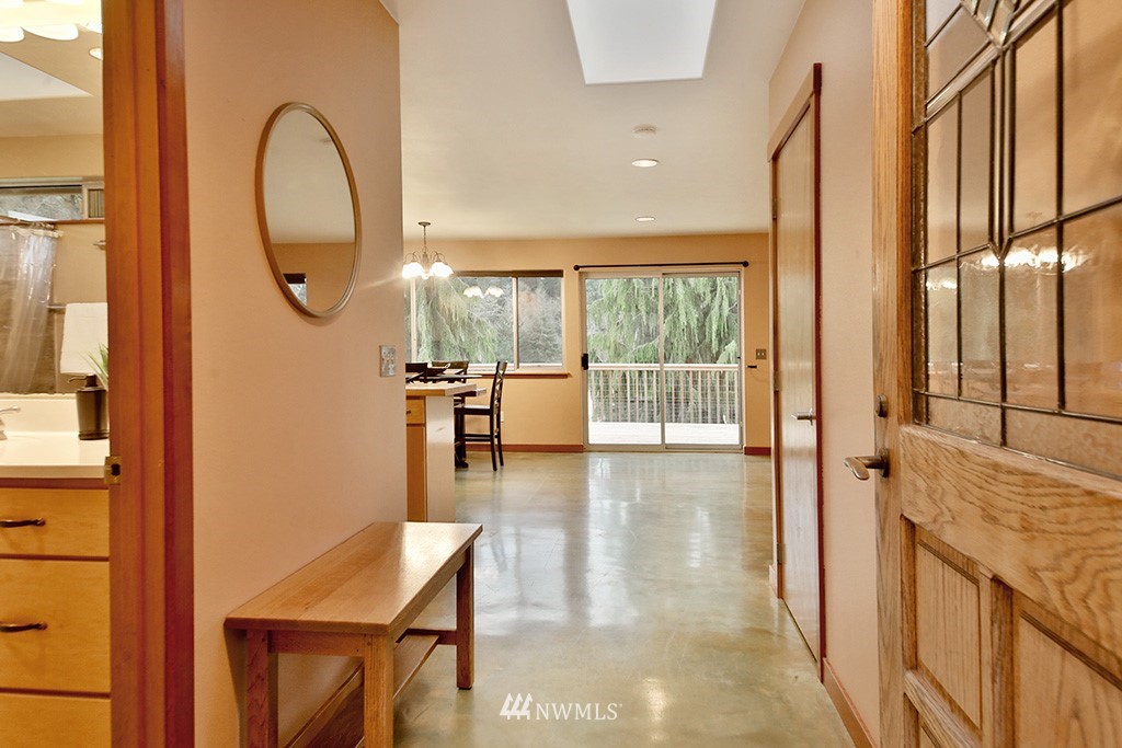 6301 Wahl Road Freeland, WA 98249 - Photo 9 of 40 a view of a living room and entry way