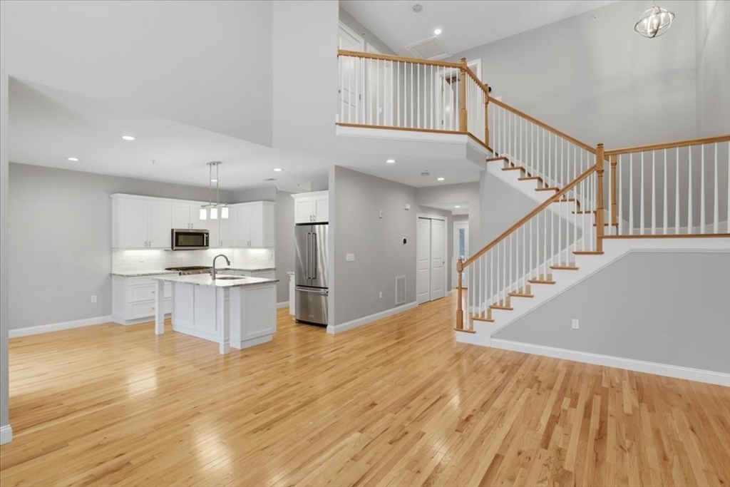 28 Eastover Road, Unit 28 Walpole, MA 02081 - Photo 15 of 34 a view of kitchen with sink and microwave