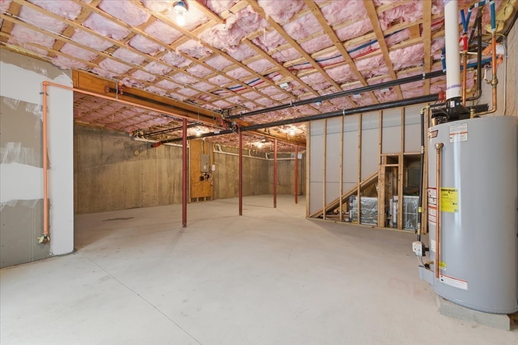 28 Eastover Road, Unit 28 Walpole, MA 02081 - Photo 28 of 34 a view of empty room with wooden walls