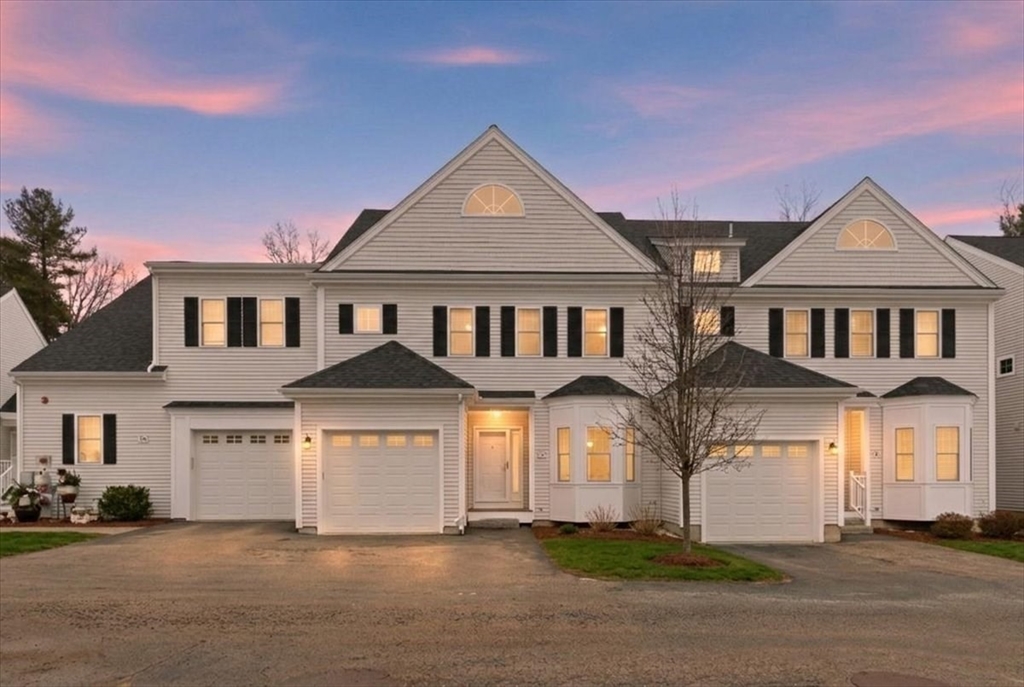 28 Eastover Road, Unit 28 Walpole, MA 02081 - Photo 31 of 34 front view of a house with a yard